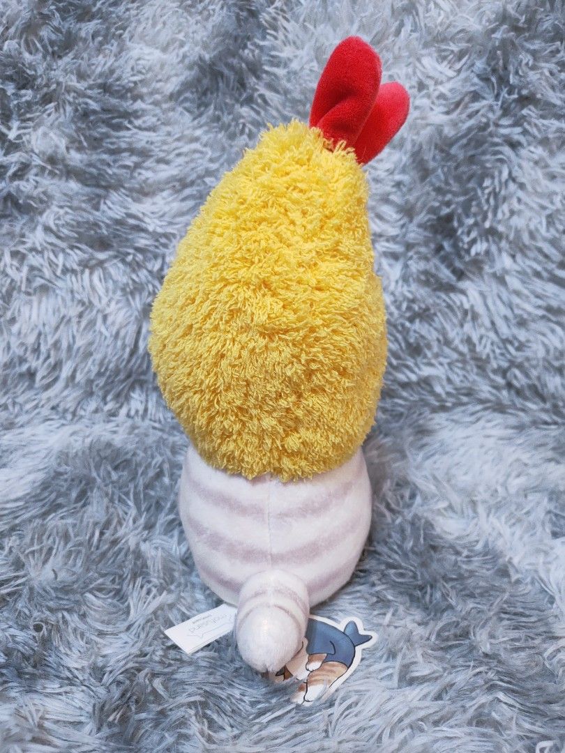 Mofusand Fried Shrimp Cat Plushie (Category: Plushies & Soft Toys) located in Antipolo. Submitted by bhabiegraciefashionlab (Listing ID 1444877804, Image 3). Description: This mofusand plush toy is the "Fried Shrimp Cat" character, featuring a soft, white feline plushie dressed in a yellow, textured shrimp costume with a red accent on top #mofusand.