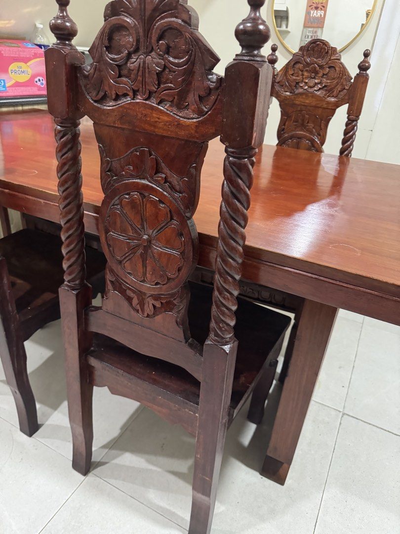 Narra Table 6 Seater Dining table (Category: Tables & Sets) located in Quezon City. Submitted by dkpestcontrolservices (Listing ID 1445011550, Image 3). Description: ✨ For Sale: Narra Table Hand‑Carved 6‑Seater Wooden Dining Set ✨ 🔥 Elegant hardwood dining table with 6 ornately carved chairs – perfect centerpiece para sa bahay! ✅ Classic Filipino craftsmanship with floral and spindle designs ✅ Glossy polished finish, sturdy construction, timeles
