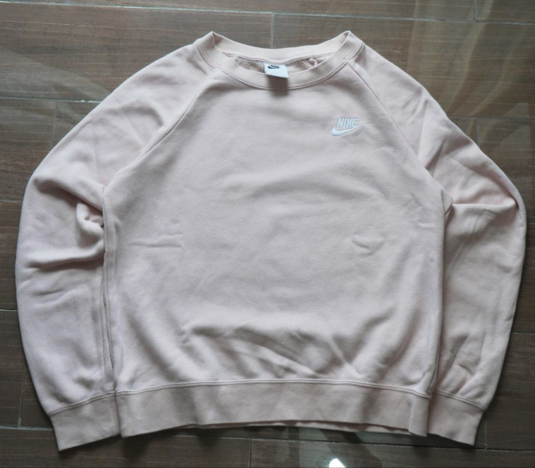Nike Pink Crewneck Sweatshirt (Category: Coats, Jackets and Outerwear) located in Makati City. Submitted by acecurates_ (Listing ID 1444966808, Image 1). Description: Dimes: W 20 (Pit to Pit) x L 22 Condition:9.5/10 Color Rate: 9.5/10 Issue: None.