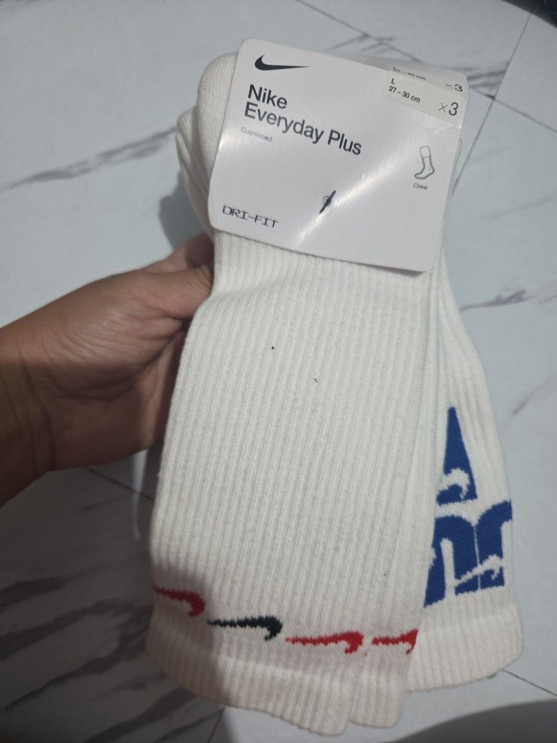Nike White Long Socks 3pairs (Category: Socks) located in Manila. Submitted by anneclariceyanga (Listing ID 1444914989, Image 2). Description: Unused Rfs: Decluttering.