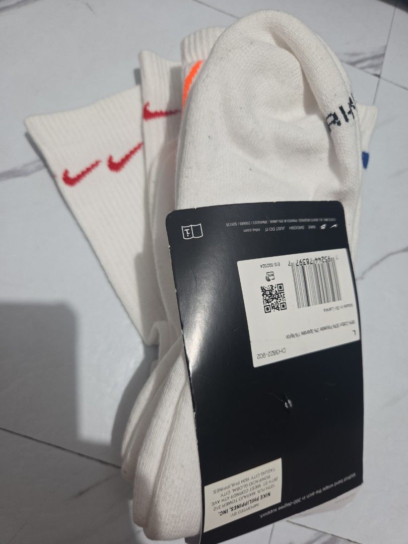 Nike White Long Socks 3pairs (Category: Socks) located in Manila. Submitted by anneclariceyanga (Listing ID 1444914989, Image 1). Description: Unused Rfs: Decluttering.