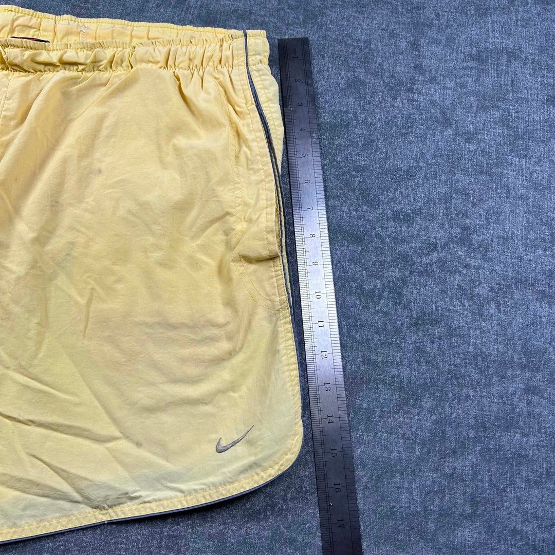 Nike Yellow Shorts Embroidered Logo (Category: Shorts) located in Manila. Submitted by emvishop (Listing ID 1444871357, Image 3). Description: Nike Yellow Shorts Embroidered Logo Price: PHP 400 Dimension: 35 x 16 Condition: Good Condition Store SKU: A-41 Please don’t hesitate to message us for inquiries or assistance with your transaction. (take note that the color may appear different due to lighting conditions).