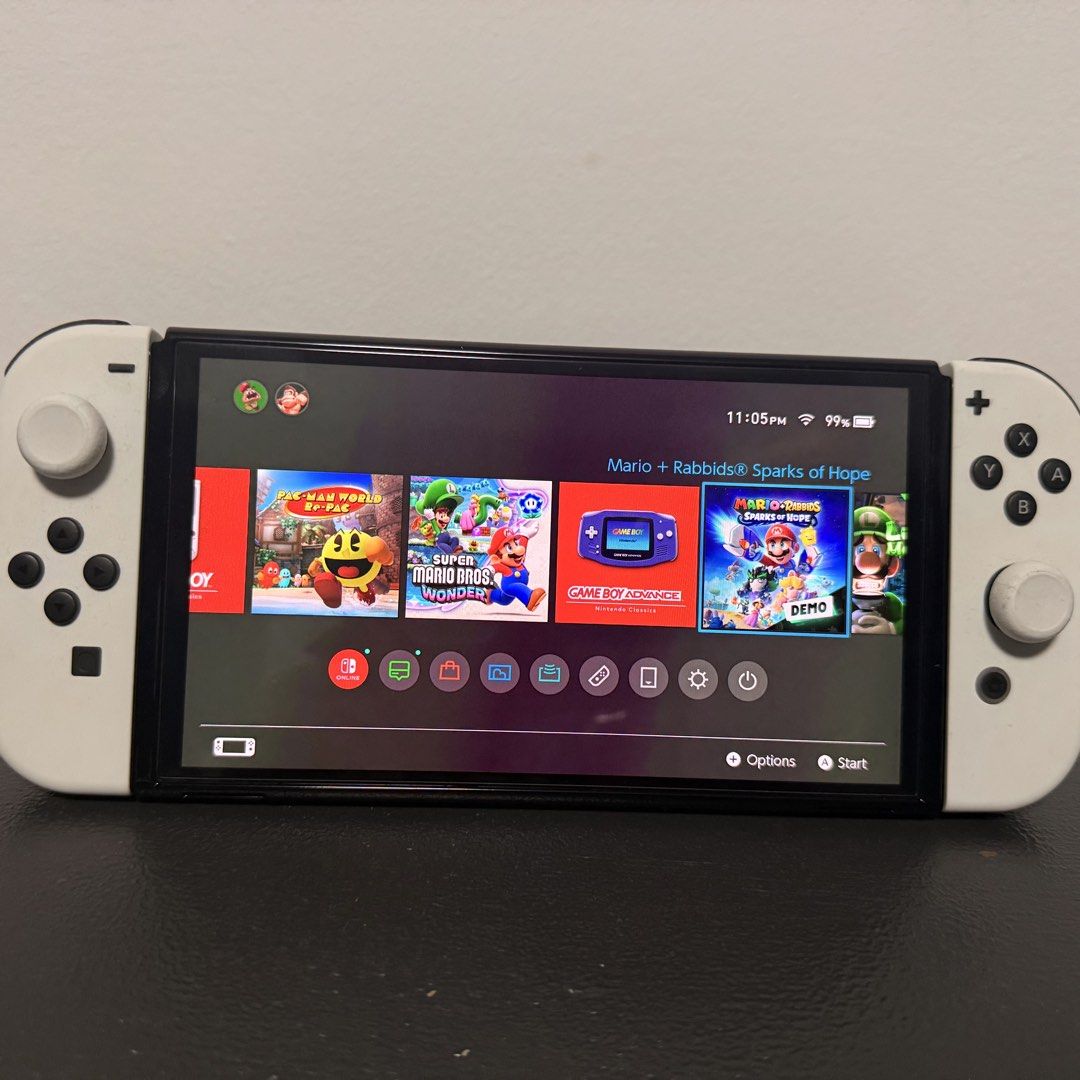 Nintendo Switch 1 OLED Complete Pack + 4 Games + 2 extra Joycon (Category: Nintendo) located in Taguig. Submitted by jemjemdelrey (Listing ID 1445029969, Image 3). Description: HELLO GAMERS! FOR SALE! 💥 🎮 Nintendo Switch 1 OLED complete pack: - Nintendo Switch OLED console (white) - Nintendo Switch dock (with LAN port) - 4 Joycon (2 white, 1 neon green, 1 neon pink) - 4 Joycon straps - Joycon Grip - High Speed HDMI cable - Nintendo Switch AC Ad