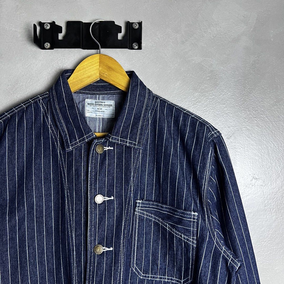 Okonkwo MFG - Pinstripe Chore Jacket (Category: Coats, Jackets and Outerwear) located in Quezon City. Submitted by cityboycrates_ph (Listing ID 1444944501, Image 3). Description: Size: XXL 29" length 23.5" width Material: Cotton Made In: Japan Condition: Excellent Color rate: 9.5/10 Issue: None Exact metrics shared upon inquiry. Take a quick moment to double-check the size & condition. Once an order is placed and confirmed, we may not be able to 