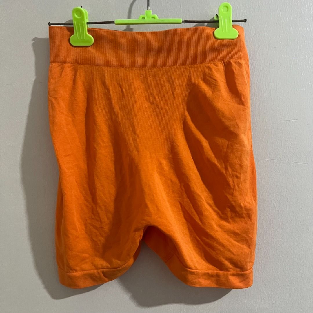 Orange Seamless Ruched Butt Lift Shorts (Category: Shorts) located in Pasay City. Submitted by leagn_07 (Listing ID 1445016409, Image 1). Description: - Super comfy seamless shorts - Bright orange color - High-waisted design - Ruched detail at the back to enhance shape - Stretchy material for a great fit - Ideal for workouts or lounging.