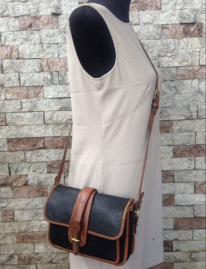 Original Dooney & Bourke Sling Bag (Category: Shoulder Bags) located in Marikina City. Submitted by arrveefm (Listing ID 1444886155, Image 1). Description: Original Dooney & Bourke Sling Bag Selling at P750.00 FIXED PRICE!!! Never expect flawless quality from Used/Pre-Owned items, otherwise might as well buy brand new. Price has already been considered on the item's current condition. Pre-Owned Item (Check pictures for visible flaws); No Meet-ups
