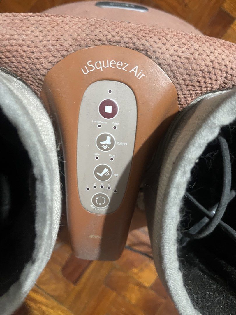OSIM uSqueez Air Foot Massager (Category: Massage Devices) located in Makati City. Submitted by missyco (Listing ID 1444967199, Image 3). Description: - OSIM uSqueez Air Foot Massager - Multiple Modes: Compress, Pulse, High, Rollers, Air - Designed for tired feet relief - Easy access with side zippers - Power cord included ONLY FOOT ROLLERS WORK.