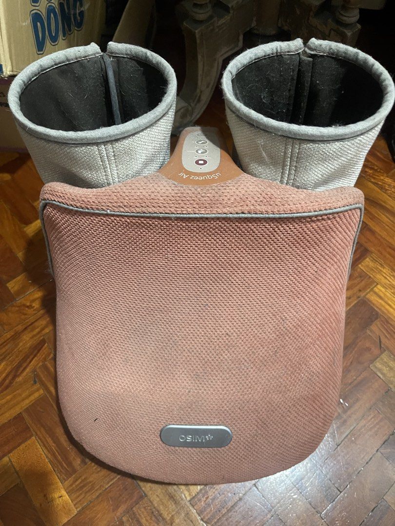 OSIM uSqueez Air Foot Massager (Category: Massage Devices) located in Makati City. Submitted by missyco (Listing ID 1444967199, Image 1). Description: - OSIM uSqueez Air Foot Massager - Multiple Modes: Compress, Pulse, High, Rollers, Air - Designed for tired feet relief - Easy access with side zippers - Power cord included ONLY FOOT ROLLERS WORK.
