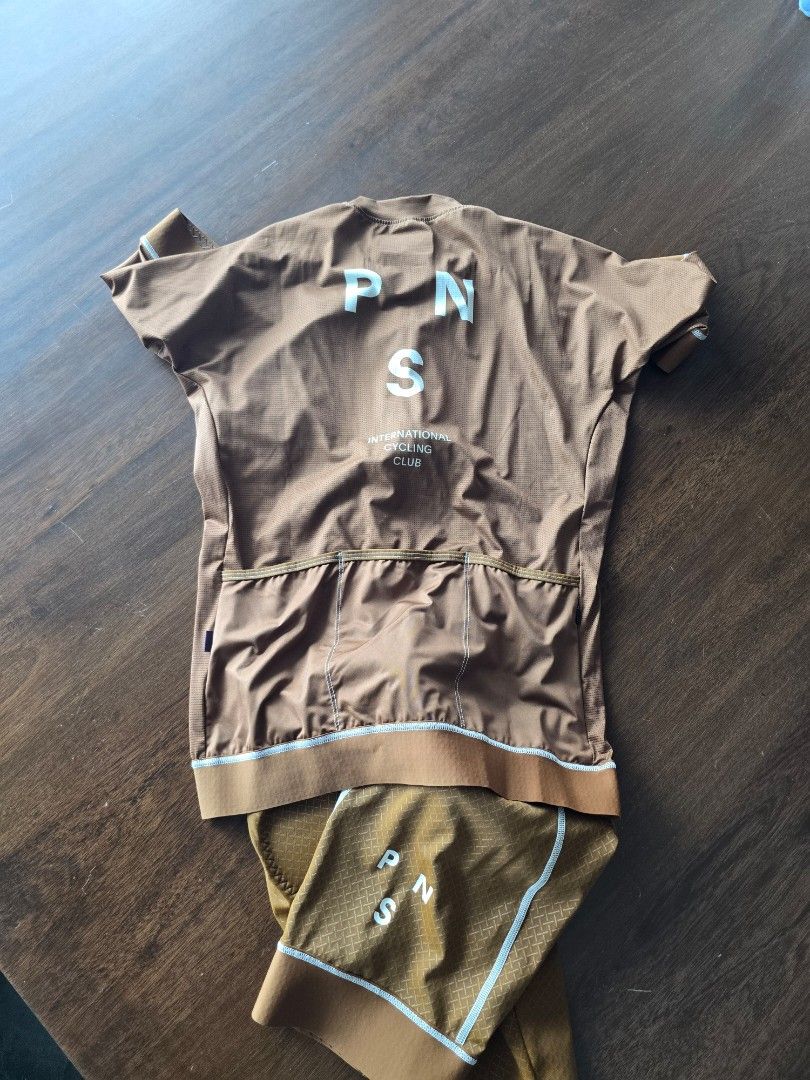 Pas Normal studios set (Category: Activewear) located in Quezon City. Submitted by mr.stealdeal (Listing ID 1445014588, Image 3). Description: - Pas Normal Studios Cycling Set (Jersey & Bib Shorts) - Color: Brown - Size: L - Jersey Features: Full zip, short sleeves - Bib Shorts Features: PNS logo on leg - Ideal for your next cycling adventure - Selling as a complete set.