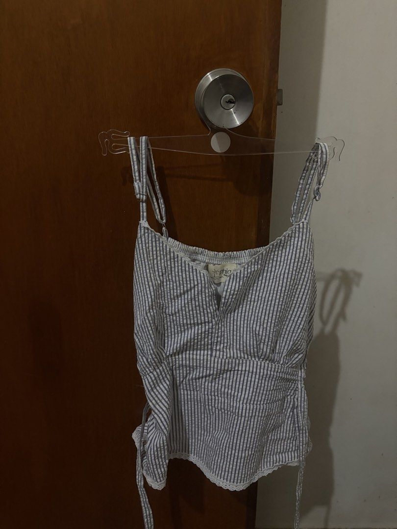 Phia the Label Blue Picnic Top (two way) (Category: Sleeveless) located in Muntinlupa City. Submitted by buuttercup (Listing ID 1444963586, Image 2). Description: RFS: too small for me (NO WHEN WORN); tried on only. Still with Phia card (minimal flaws on the card) Size S (tho I believe it runs a bit small), bought for around 1.1-1.3k at a pop-up. This is already washed and cleaned. For petite girlies.