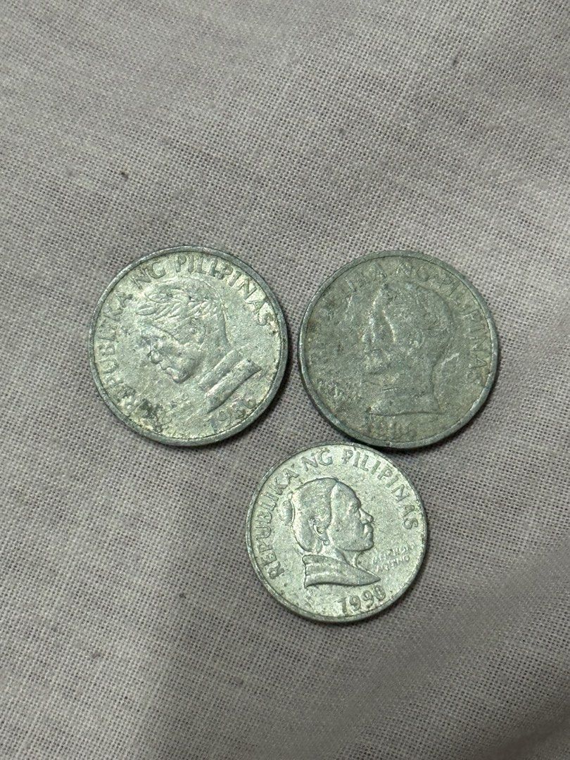 Philippine Coins - 1986, 1990,!10 Sentimo, 5 Sentimo (Category: Currency) located in Manila. Submitted by rachel.lee5521 (Listing ID 1444967253, Image 1). Description: - Collection of Philippine coins - Includes: 1986, 10 sentimo (2 pcs) and 1990 5 sentimo (1 pc) - Condition: Used - Ideal for coin collectors or display purposes - Limited stock, grab them now!.