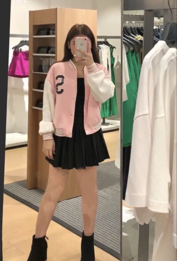 Pink & White Varsity Jacket with '2' Detail (Category: Coats, Jackets and Outerwear) located in Manila. Submitted by lotasophia37897 (Listing ID 1444931958, Image 1). Description: - Cute pink and white varsity jacket - Features a '2' patch on the chest - Great for casual wear - Pairs well with skirts or jeans - Perfect for cooler evenings.