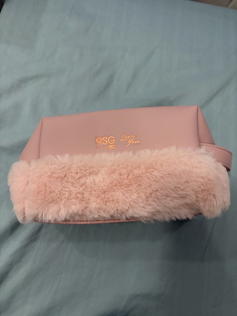 Pink Faux Fur Makeup Bag (Category: Purses & Pouches) located in Cavite. Submitted by mbsj23 (Listing ID 1444973781, Image 1). Description: - Adorable pink cosmetic bag - Features fluffy faux fur trim - Stylish rose gold zipper closure - Spacious interior for all your essentials - Includes a clear zippered pocket for organization - Ideal for makeup and toiletries - Perfect size for travel or everyday use.