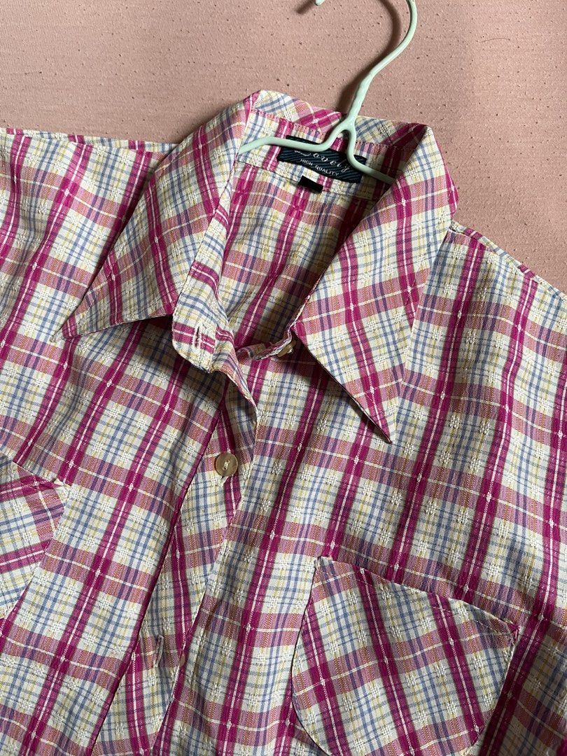 PINK Plaid Short Sleeve Button-Up Shirt (Category: Blouses) located in Nabua. Submitted by twelvet (Listing ID 1444882727, Image 3). Description: - Classic plaid short-sleeve shirt - Features a pink, white, and blue pattern - Two chest pockets - Button-up front - Ideal for casual wear - SMALL TO MEDIUM.