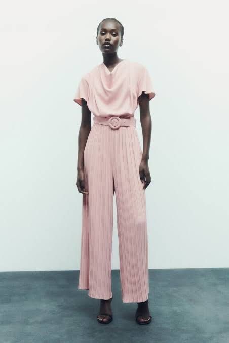 Pink Pleated Jumpsuit with Belt (Category: Jumpsuits) located in Buguey. Submitted by ocloset0324 (Listing ID 1444917172, Image 2). Description: Worn once!! 1200!! Xs fits upto semi medium.