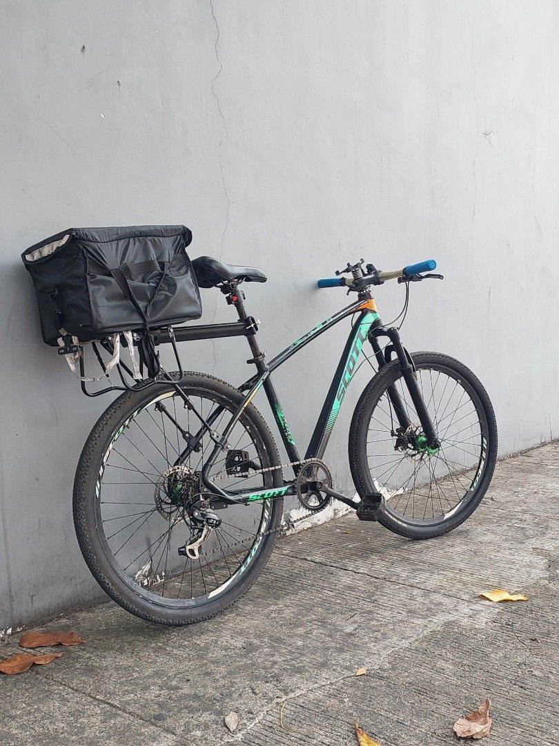 Polygon Mountain Bike with Pannier Bag (Category: Bicycles) located in Manila. Submitted by _lndnvnz (Listing ID 1445024450, Image 1). Description: - Polygon mountain bike - Ready to ride - Includes rear rack with black pannier bag - Blue handlebar grips - Ideal for commuting and trails issue fork hindi na naga bounce and the rest all goods na note; hindi po kasama ang carrier and thermal bag .