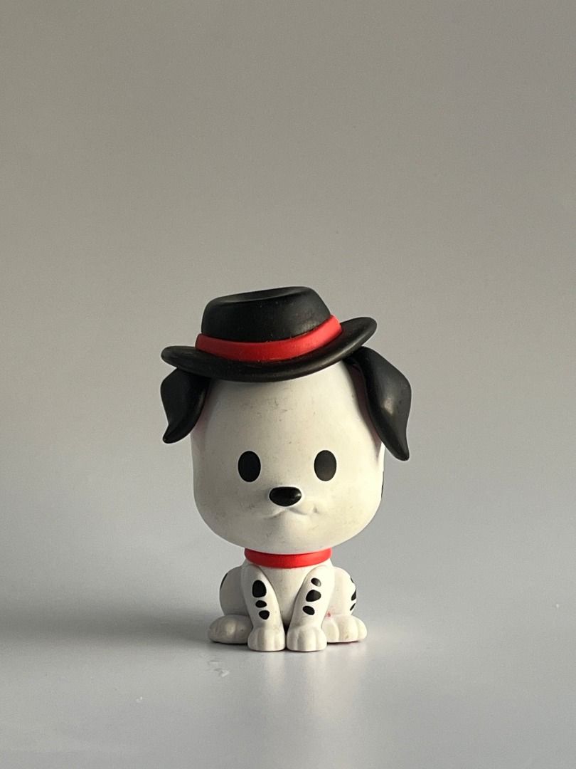 Pop Mart Disney Classic Animals Series "Pongo" (Category: Other Home Decor) located in Bacoor. Submitted by marnievera (Listing ID 1445015599, Image 1). Description: This figure is a Pop Mart Disney Classic Animals Series "Pongo" mini figure. Based on the classic animated movie 101 Dalmatians, the 3-inch collectible depicts the father dog wearing a signature black fedora with a red band and a matching red collar..