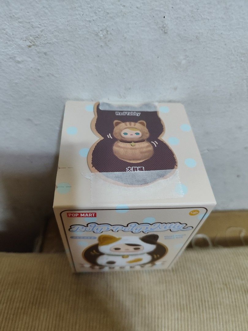 Pucky roly poly kitty series vinyl plush Red tabby (Category: Designer & Blind Box Toys) located in Quezon City. Submitted by hirayakarilagan (Listing ID 1444915681, Image 2). Description: Pucky roly poly kitty series vinyl plush Red tabby sealed foil opened bottom box Garfield look alike 🚨below srp of 900🚨.