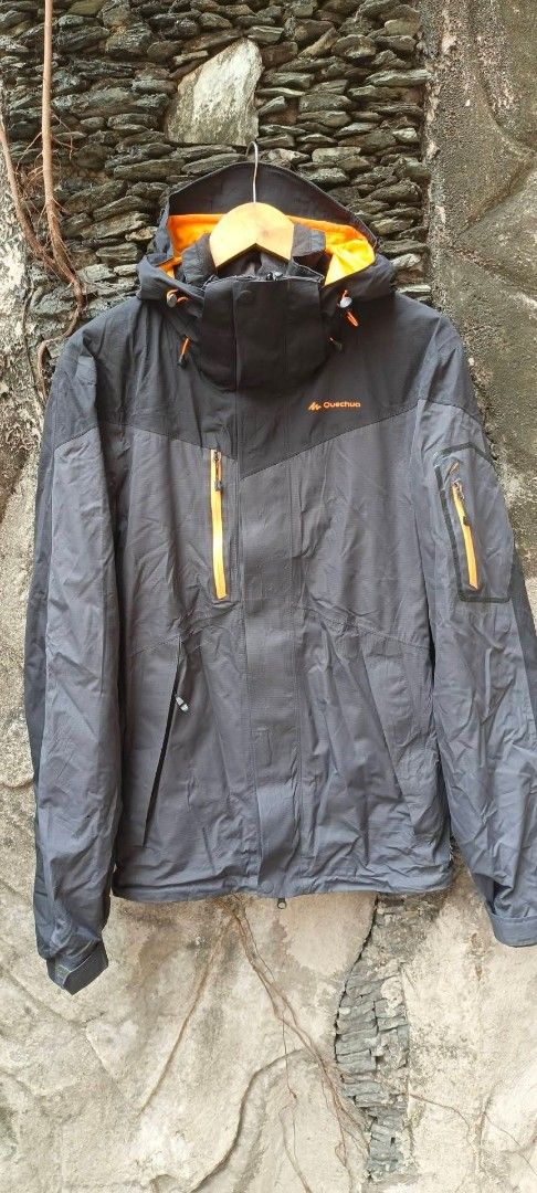 Quechua Waterproof Hooded Jacket Orange Accents (Category: Coats, Jackets and Outerwear) located in Manila. Submitted by kyabhe (Listing ID 1444979761, Image 1). Description: - Quechua jacket with vibrant orange lining and zipper details. - Features a convenient hood for extra protection. - Multiple pockets for secure storage. - Water-resistant material, ideal for outdoor adventures. - Great for hiking, camping, or rainy day wear. - Selling as it