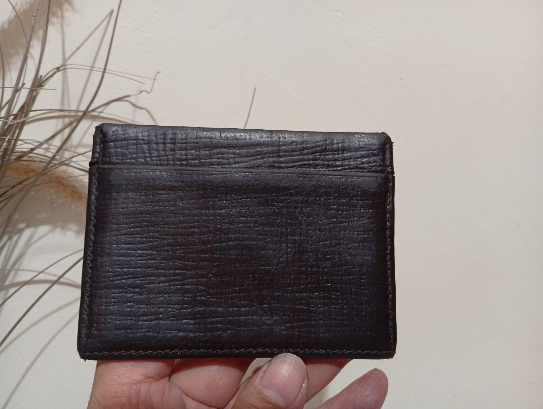 RABEANCO™️ CARD WALLET (Category: Luxury Bags & Wallets) located in Baguio. Submitted by Zagada (Listing ID 1444882511, Image 2). Description: RABEANCO™️ CARD WALLET Dark Brown 4 Slots Size 3" x 4" Preloved in good condition Gold brand print almost erased Has signs of use but sturdy soft Kept in a smoke free environment Location- Baguio City 🫶💕🤗.