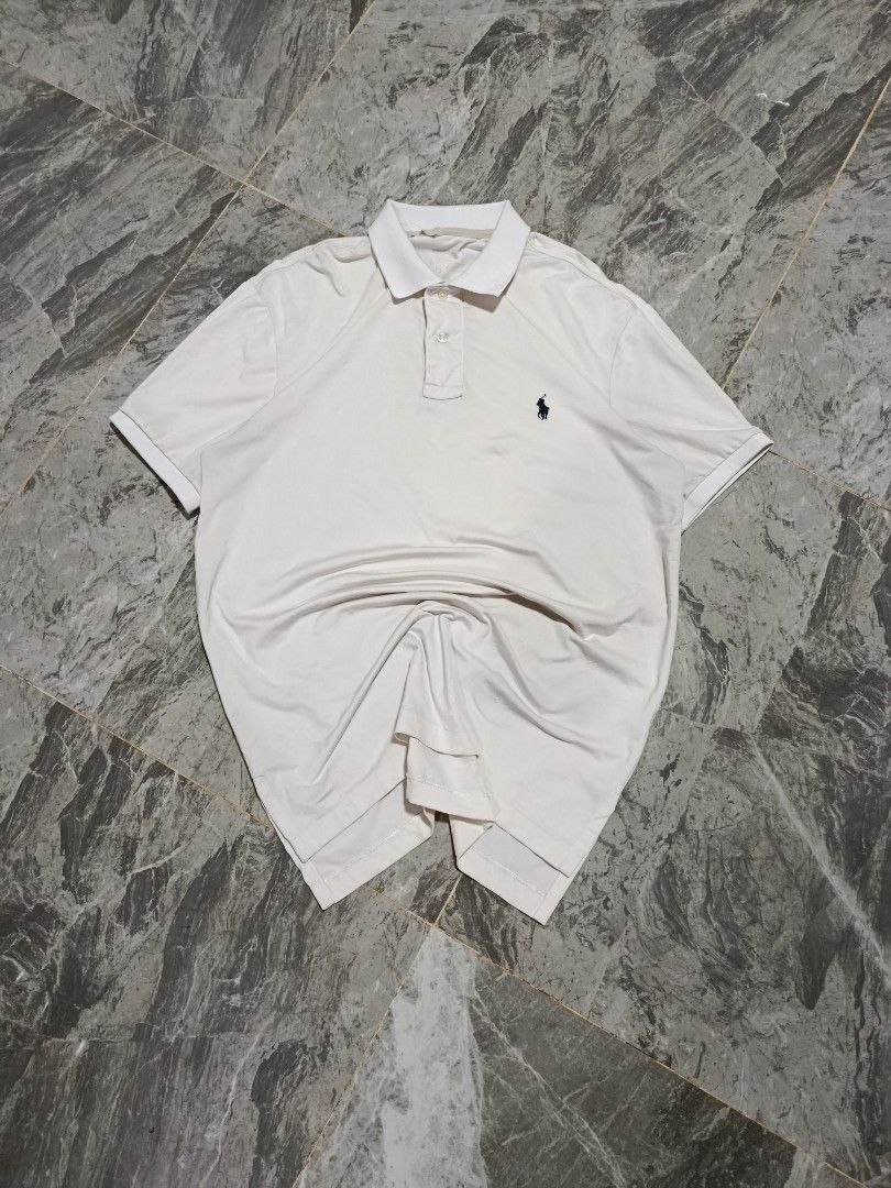 Ralph Lauren Performance Polo Shirt (Category: Tshirts & Polo Shirts ) located in Prosperidad. Submitted by basicdept07 (Listing ID 1444938621, Image 1). Description: Ralph Lauren Performance Polo Shirt Mine:🏷️349+sf Dimes: 21 width/ 28.5-31 length Complete tags Color rate and condition: 9.5/10 Loose stitch and minimal stain Kindly dm if interested 📥.
