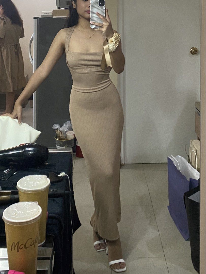 Ribbed Knit Maxi Dress - Beige (Category: Dresses) located in Manila. Submitted by ca.finds (Listing ID 1444962469, Image 1). Description: - Beige ribbed knit maxi dress - Sleeveless with a square neckline - Fitted silhouette - Ankle length - Comfortable and stretchy material - Versatile: perfect for dressing up or down, night out, or casual events.