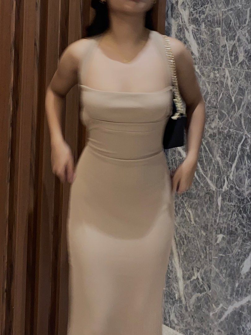 Ribbed Knit Maxi Dress - Beige (Category: Dresses) located in Manila. Submitted by ca.finds (Listing ID 1444962469, Image 2). Description: - Beige ribbed knit maxi dress - Sleeveless with a square neckline - Fitted silhouette - Ankle length - Comfortable and stretchy material - Versatile: perfect for dressing up or down, night out, or casual events.