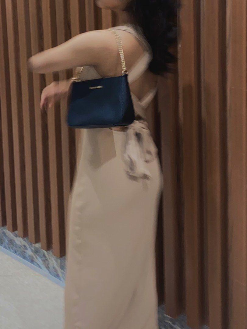 Ribbed Knit Maxi Dress - Beige (Category: Dresses) located in Manila. Submitted by ca.finds (Listing ID 1444962469, Image 3). Description: - Beige ribbed knit maxi dress - Sleeveless with a square neckline - Fitted silhouette - Ankle length - Comfortable and stretchy material - Versatile: perfect for dressing up or down, night out, or casual events.