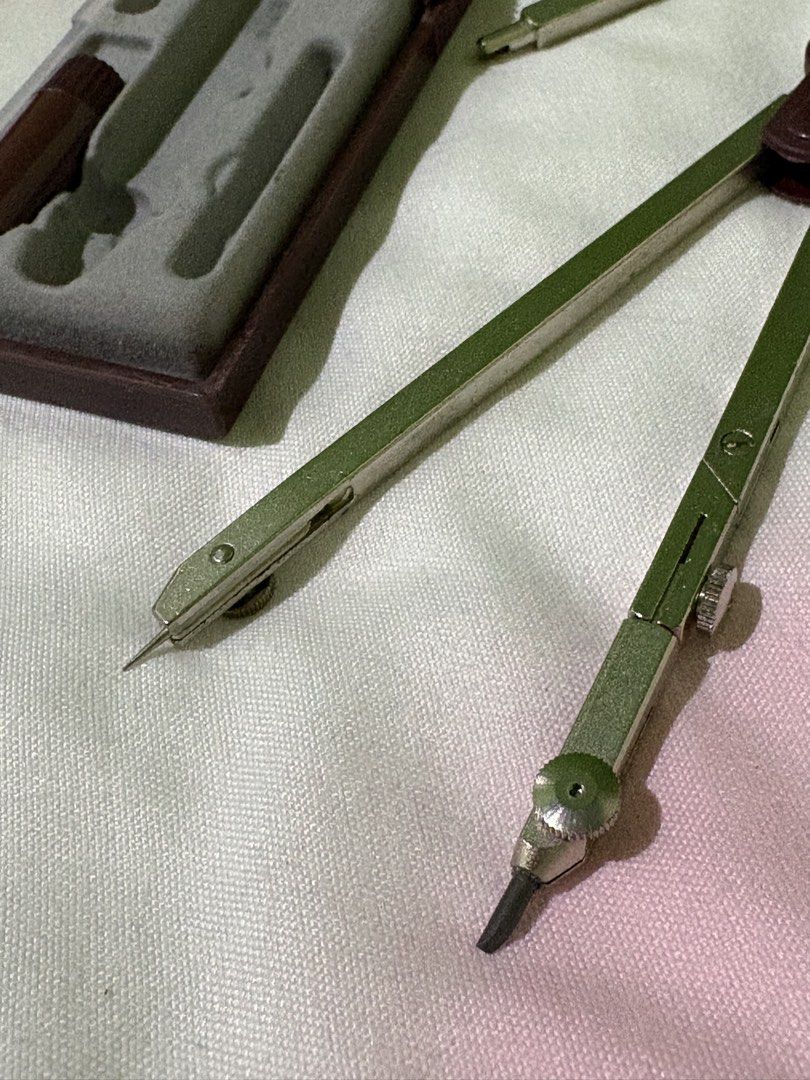 ROTRING Rotating Compass (Category: Stationery & School Supplies) located in Los Banos. Submitted by hikerxxdesigner (Listing ID 1444879479, Image 2). Description: Rotring Compass •good for engineering / architecture plan drawings for student •has sign of usage but still functional •has graphite refill Condition - 7/10 ✨ rfs: used this way back during college days :) not using it anymore :) .