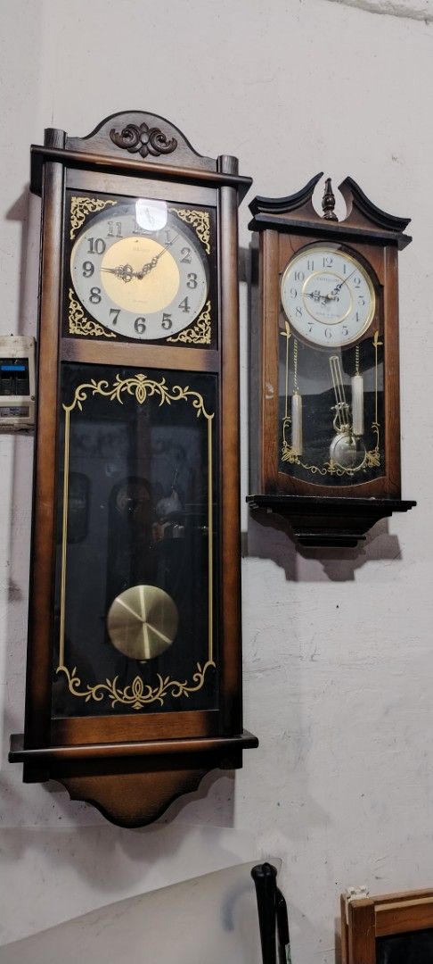 Seiko Quartz Pendulum Wall Clock (Category: Clocks) located in Caloocan City. Submitted by rowely_jpn (Listing ID 1444991778, Image 2). Description: Selling a Seiko Quartz pendulum wall clock. Wood casing with decorative gold accents. The pendulum swings to keep time. Great for living room or hallway. Measures approximately [height] x [width] x [depth]. Battery operated ,working ..