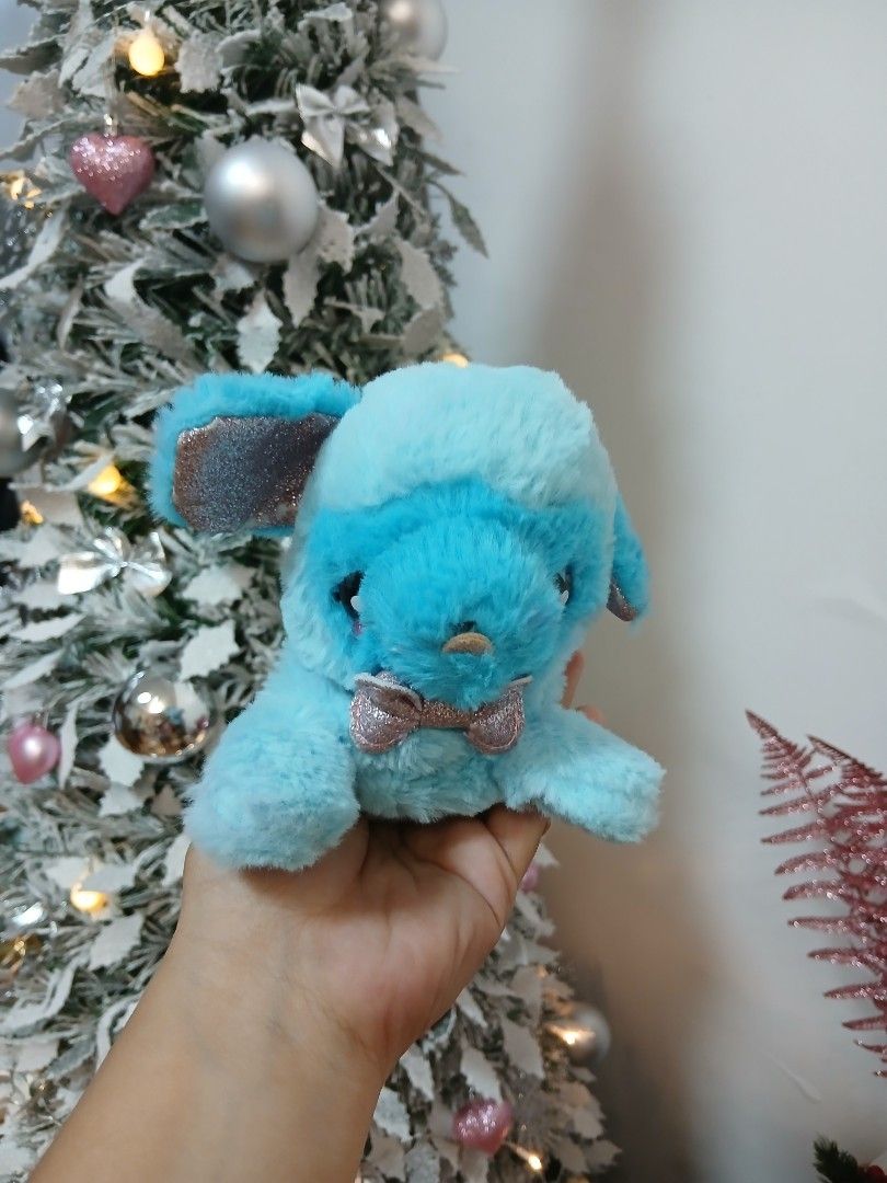 Smiggle Blue Plush Dog Pencil Case (Category: Plushies & Soft Toys) located in Calamba. Submitted by thepinkpicksee (Listing ID 1444861058, Image 3). Description: - Adorable blue plush pencil case shaped like a cute dog. - Secure zipper closure to keep your items safe. - Embroidered Smillie logo on top for authenticity. - Fun paw print details on the feet. - Ideal for storing stationery, pens, pencils, or other small essentials. - A playful and p