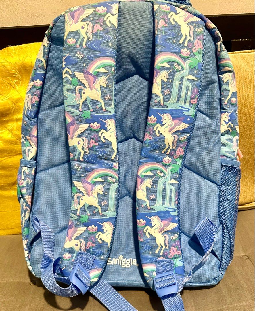 Smiggle Far Away Backpack with Four Zipped Compartments Unicorn Print (Category: Backpacks) located in Manila. Submitted by preloved_by_ea (Listing ID 1444876210, Image 2). Description: Girls bag - bago hindi nagamit - nakastock na lang Details: Four Zipped Compartments - Main Compartment With Double Zip Dual Drink Bottle Sleeves Padded Adjustable Shoulder Straps & Padded Carry Handle 15-Inch Laptop Compartment & Lined Media Device Pocket With He
