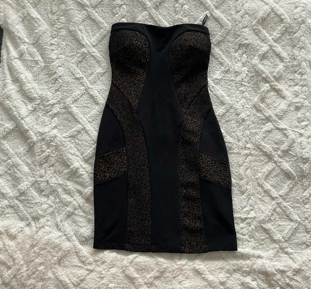 Snap Black Strapless Dress with Leopard Print Accents (Category: Dresses) located in Baguio. Submitted by deardiaryy (Listing ID 1444872017, Image 1). Description: - Black strapless dress by Snap - Eye-catching leopard print paneling on sides and bust - Secure zipper closure at the back - Size: S - Origin: Made in Vietnam.