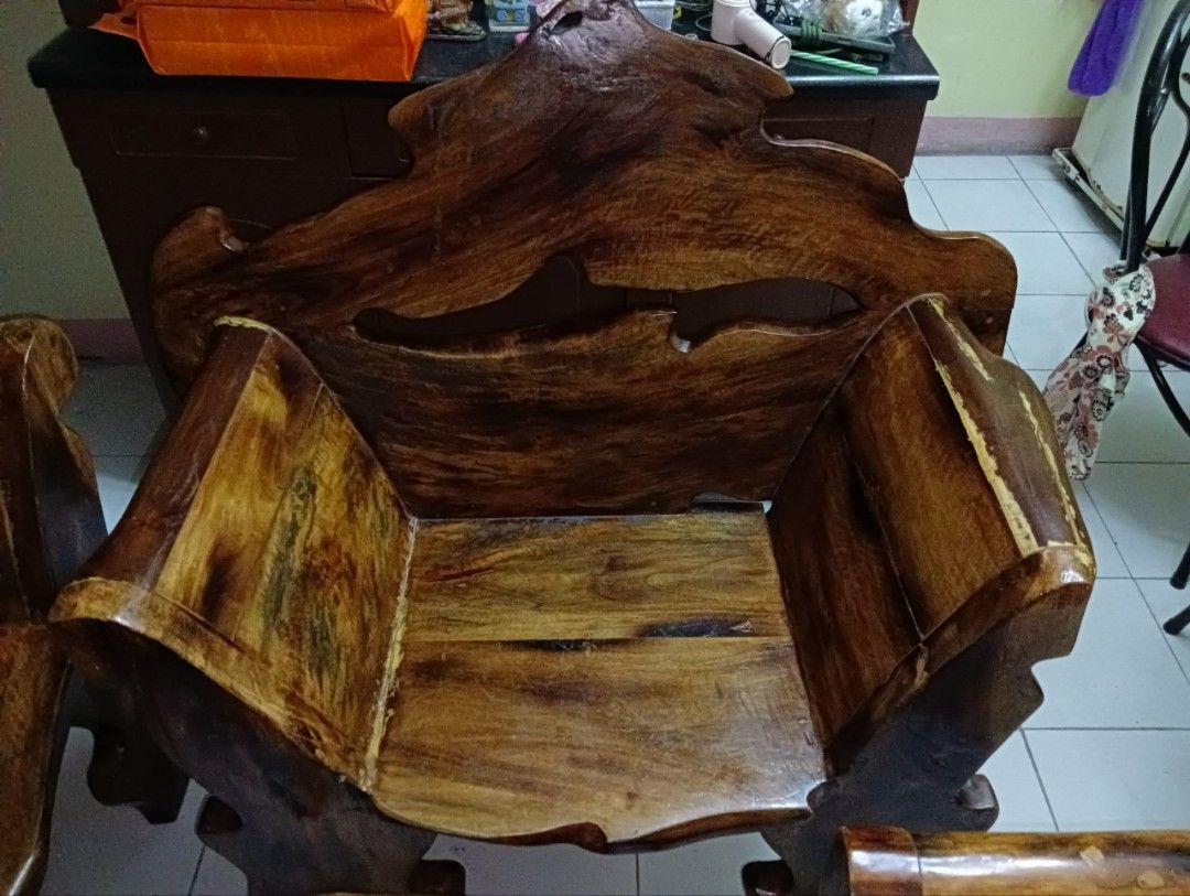 Hard wood Sala Set with TV table and Vanity (Category: Tables & Sets) located in Quezon City. Submitted by fibsy (Listing ID 1445034990, Image 2). Description: Unique solid wood living room set. The natural wood grain and irregular shapes make each piece one-of-a-kind. Sala set and Vanity with chair. 7 pieces in total. Sturdy construction. Selling as a set. likes new dahil alagang alaga. makintab at mabigat yung kahoy na ginamit. di namin alam yu