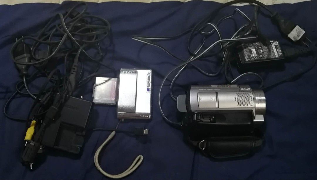 Sony Digicam and Videocam (Category: Video Cameras) located in Caloocan City. Submitted by northcalonlinesell (Listing ID 1444981116, Image 1). Description: For sale, Sony Videocam and Digicam, with complete accessories Digicam, no issues, just signs of usage Videocam, issue is yung battery ay palitin na, kailangan nakacharge para mabuksan, paki-palitan na lang ng bagong battery and may E:31 HDD format error code Bundle for Php 7k na lang. Llano,