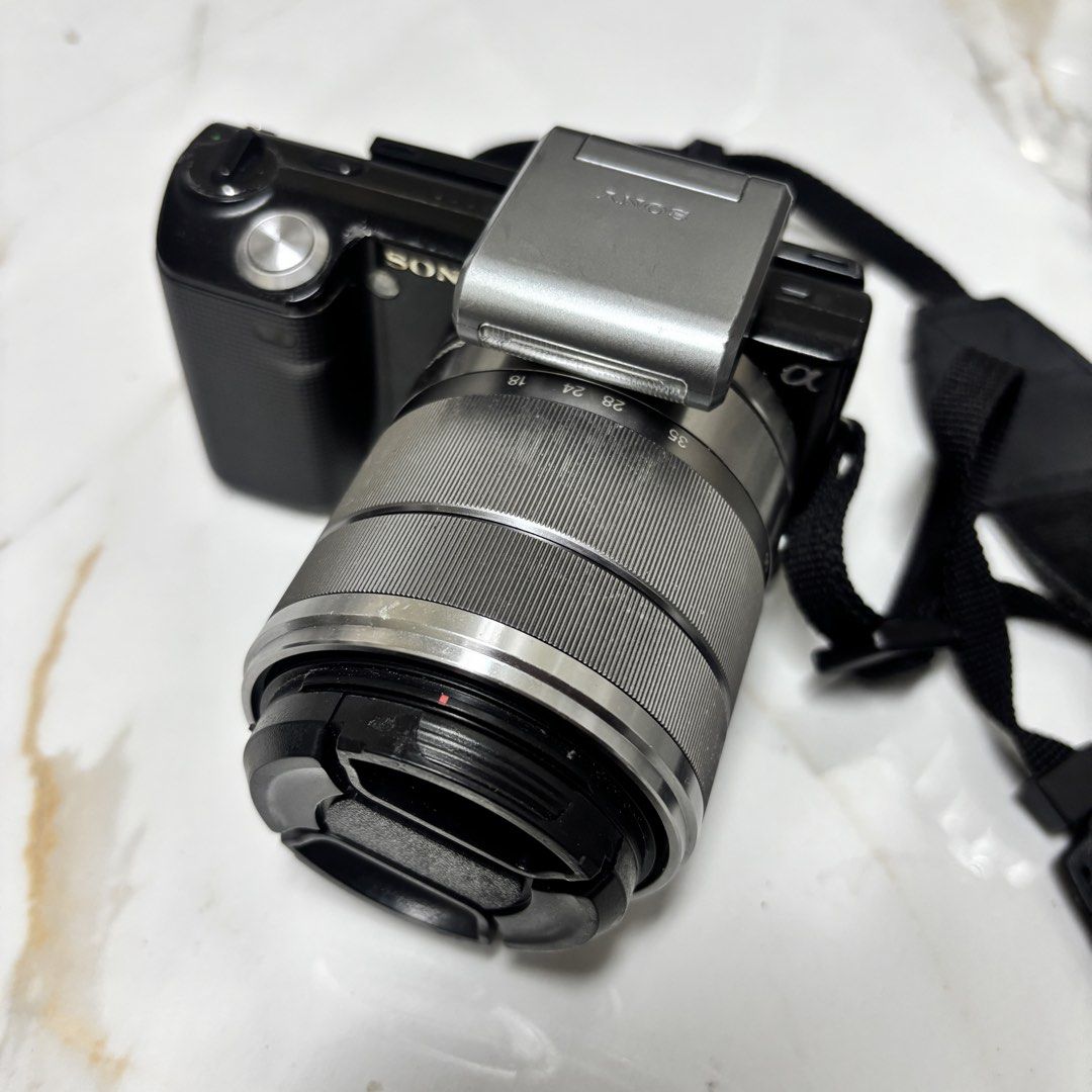 Sony NEX-5 Mirrorless Camera with Lens (Category: Cameras) located in Manila. Submitted by mleia (Listing ID 1444984403, Image 2). Description: 📸 FOR SALE: Sony NEX-5 Mirrorless Camera Compact, stylish, and great for everyday photos & content! ✨ 14.2MP • Full HD Video • Interchangeable Lens ₱8,499 📦 Package Includes: ✅ Sony NEX-5 Body ✅ 18-55mm and 55-210mm Kit Lens ✅ Battery & Charger ✅ SD Card ✅ Camera bag ✅ Camera strap 🔍 Key Features: 📷 1