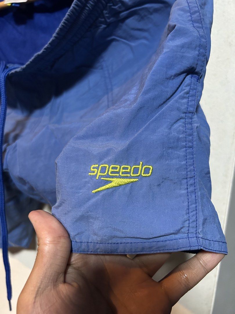 Speedo Blue Swim Shorts Size S (Category: Swim Trunks & Board Shorts) located in Manila. Submitted by popluxeph_ (Listing ID 1444877237, Image 2). Description: - Blue Speedo swim shorts - Elastic waistband with drawstring - Back pocket with button closure - Embroidered Speedo logo on left leg - Ideal for swimming and lounging.
