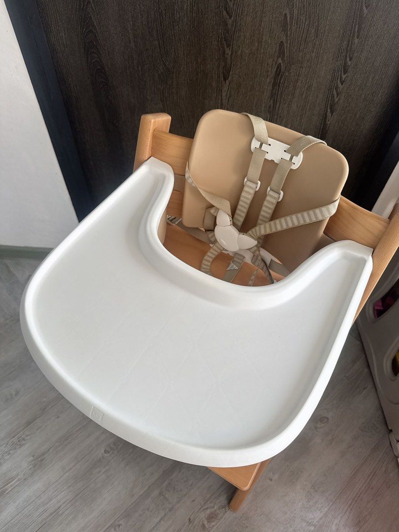 Stokke Tripp Trapp High Chair for Baby in Natural (Category: Baby High Chairs) located in Singapore. Submitted by hibyejames (Listing ID 1444893493, Image 3). Description: Price is firm. All authentic. Includes tray, harness, baby set and gliders. Will throw in the cushion for free! Self collect from tampines or add $25 for courier delivery..