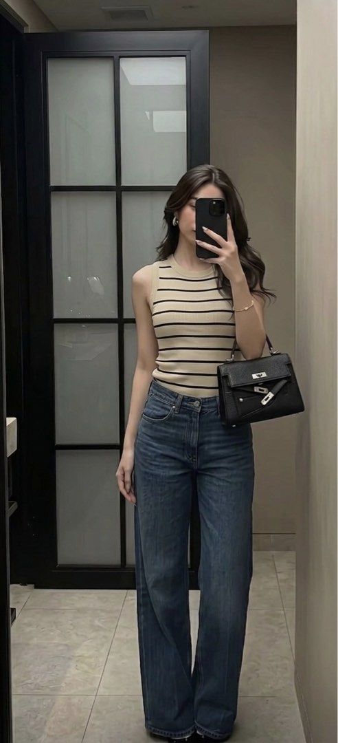 Stripes Knit With Collar and Zipper (Category: Others Tops) located in Manila. Submitted by kellemirah (Listing ID 1444912814, Image 2). Description: Stripes knit top - 380 Black leather top sling/handle bag (comes with dust bag) - 1000.