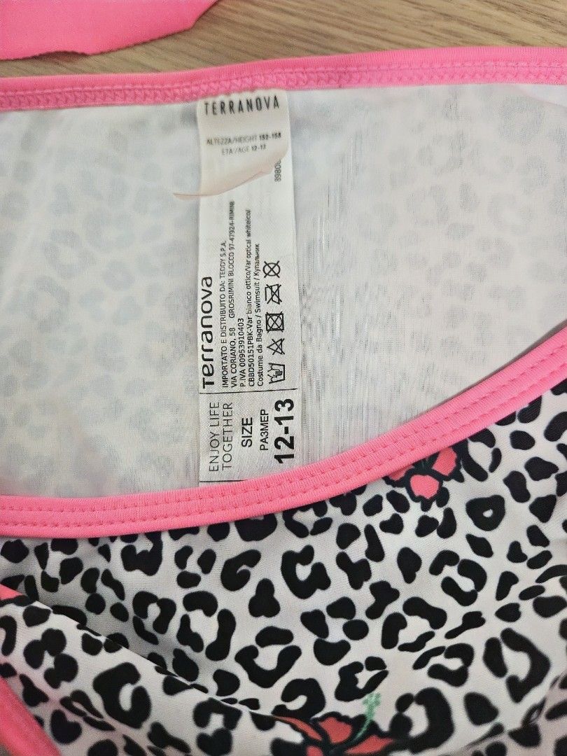 Terranova Kids Pink Summer Bikini Set Leopard Print (Category: Babies & Kids Fashion) located in Santa Rosa. Submitted by deetoledo (Listing ID 1444956863, Image 3). Description: - Cute pink bikini set from Terranova Kids. - Top features 'Summer' graphic and ruffled overlay. - Adjustable straps on the top for a perfect fit. - Bottoms have a fun leopard print with pink trim. - Adorable butterfly details on the bottoms. - Ideal for beach trips and 