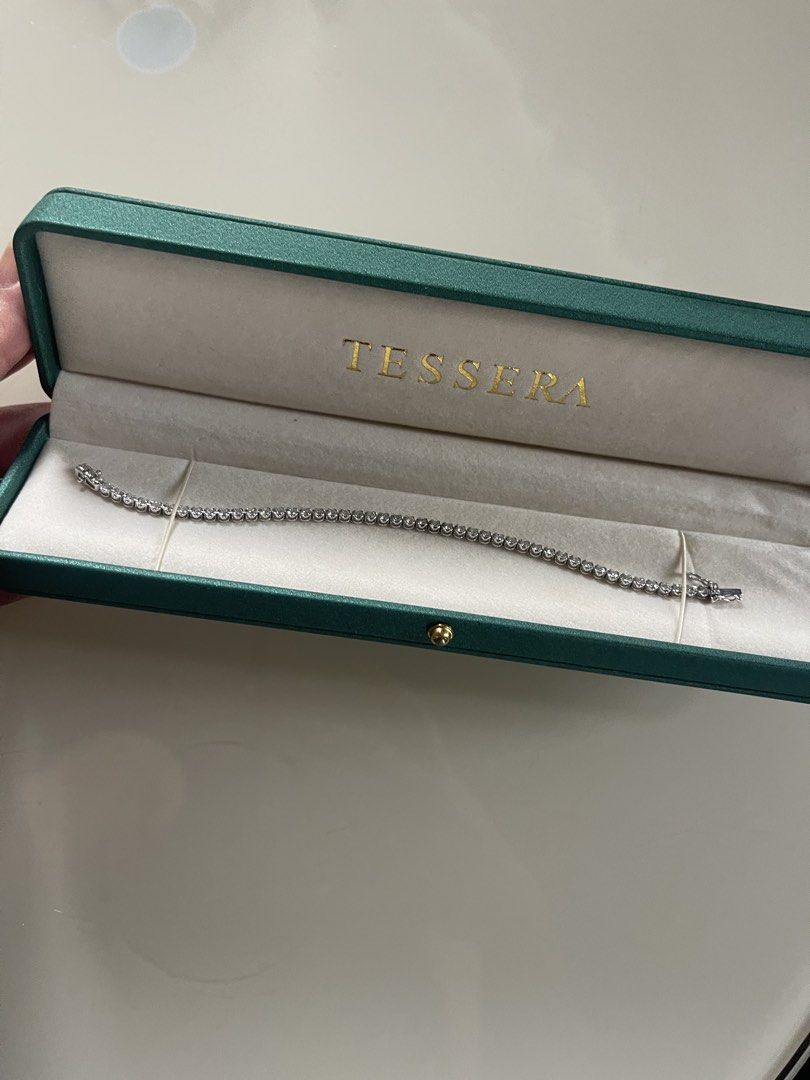Tessera Diamond Tennis Bracelet (Category: Bracelets) located in Taguig. Submitted by patdd_123 (Listing ID 1444858174, Image 1). Description: - Beautiful Tessera tennis bracelet - Features a line of sparkling diamonds - Comes with original Tessera jewelry box - Secure clasp for peace of mind - Classic, versatile design for any outfit - Ideal for both special occasions and daily wear.