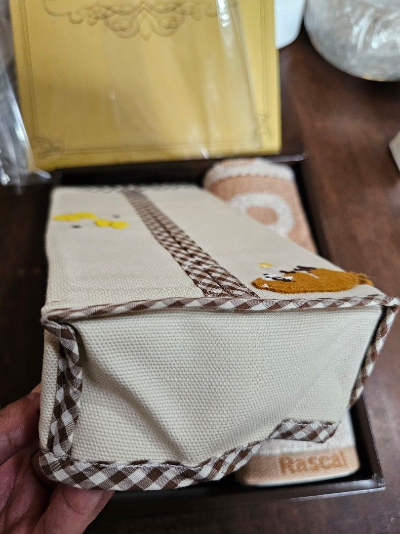 SALE❗️Tissue Cover Set (Category: Towels, Napkins & Holders) located in Quezon City. Submitted by senyoramaria (Listing ID 1444948649, Image 1). Description: Raccoon Rascal Set 1 x Face Towel 1 x Tissue Cover 10 x 5 inches New with box. Php300❗️.