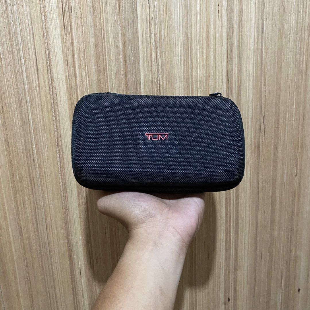 Tumi for Delta Travel Case Pouch (Category: Luxury Bags & Wallets) located in Dipolog. Submitted by thriftcher (Listing ID 1445018333, Image 1). Description: - Genuine Black Tumi travel case - Features 'for Delta' branding inside - Secure zipper closure - Durable hard shell exterior for protection - Ideal for organizing small travel items - Compact and easy to pack Dm..