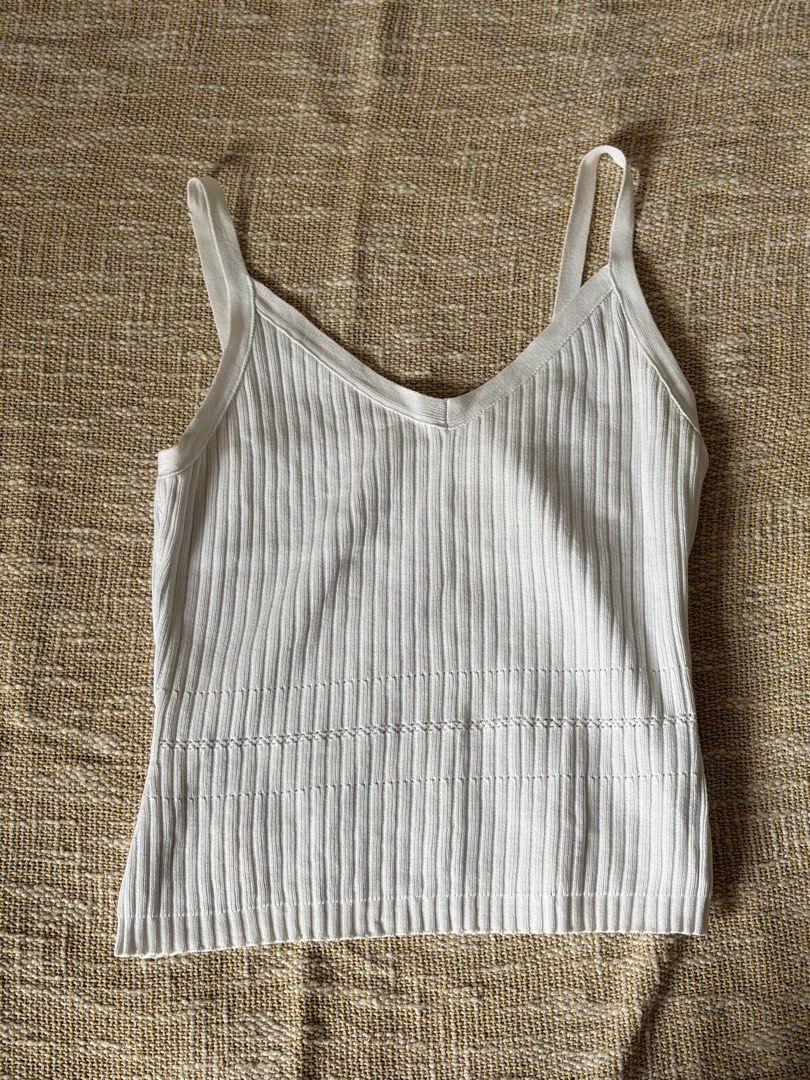 V neck sleeves tank top white (Category: Shirts) located in Pasig City. Submitted by ctiner (Listing ID 1444943488, Image 1). Description: Xs-s.