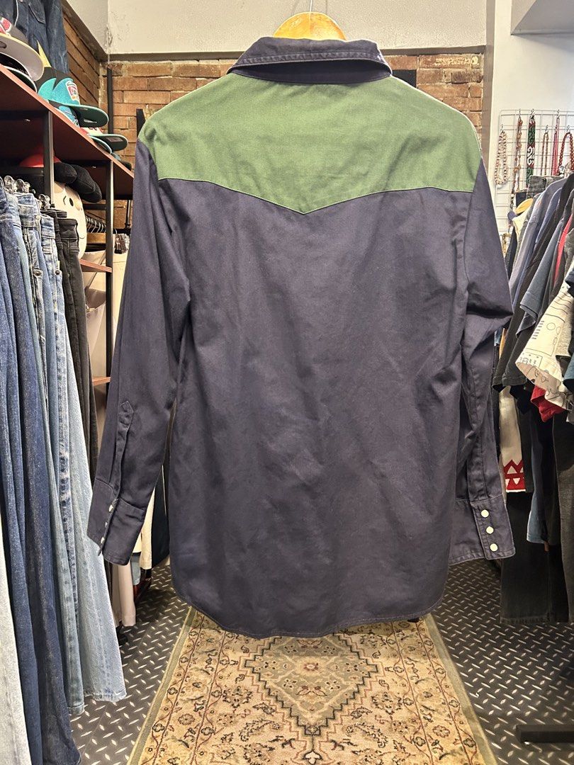 Vintage 80s-90s RUSTLER by Wrangler (Category: Tshirts & Polo Shirts ) located in Quezon City. Submitted by pricetakedown (Listing ID 1444972062, Image 2). Description: Vintage 80s-90s RUSTLER by Wrangler Excellent condition | Size: 2XL Php 1,299 Measurements (inches) Armpit to armpit: 20.5 Shoulders: 19 Sleeves: 24 Length: 27.5 . 🫶🏻 Manage your expectations. Check photos and details thoroughly ✨ Items have been washed and sanitized 💡Actual co
