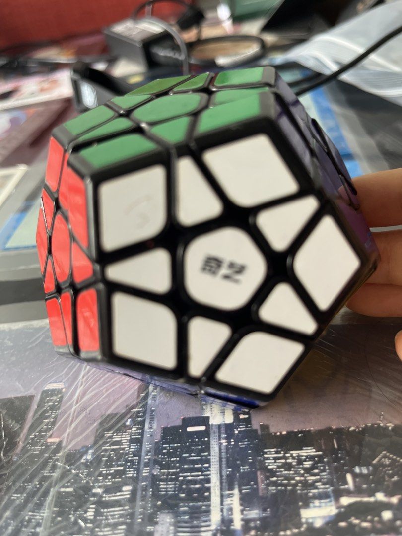 Rubik's Cubes (Category: Board Games & Puzzles) located in Singapore. Submitted by epiceagle-6922 (Listing ID 1442978310, Image 2). Description: rubiks cube all for $18 official rubiks brand cube $6 standard 3x3 cube $3 mini cube keychain $1 megaminx $10 the rest free.