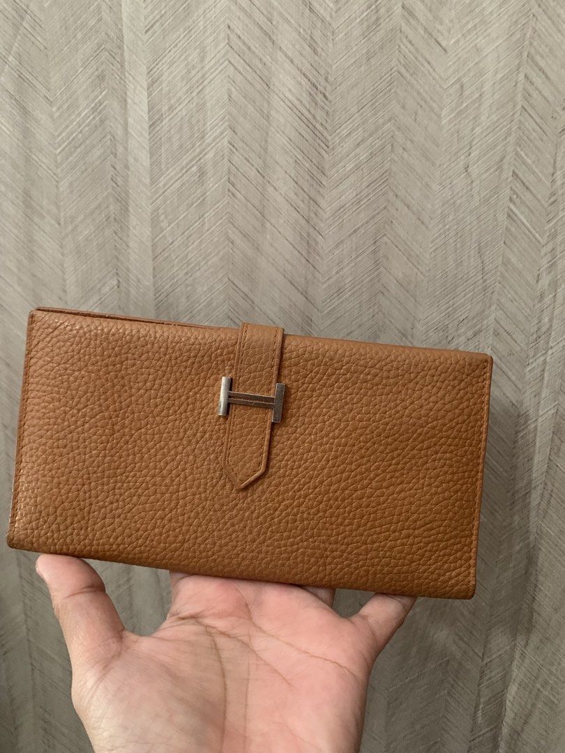 Vintage hermes bearn wallet (Category: Luxury Bags & Wallets) located in Antipolo. Submitted by madluxjapan (Listing ID 1445041916, Image 1). Description: Materials: chevre leather Color: orange (gold) Hardware: silver Card slot: 5 Open pocket :4 Coin purse: 1.