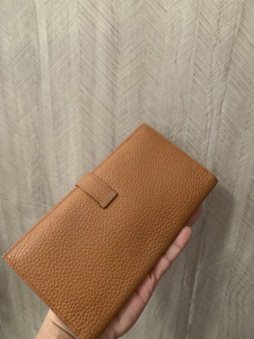 Vintage hermes bearn wallet (Category: Luxury Bags & Wallets) located in Antipolo. Submitted by madluxjapan (Listing ID 1445041916, Image 2). Description: Materials: chevre leather Color: orange (gold) Hardware: silver Card slot: 5 Open pocket :4 Coin purse: 1.