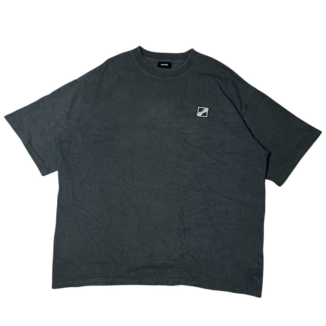 WE11DONE Oversized Graphic T-Shirt (Category: Tshirts & Polo Shirts ) located in Naga. Submitted by eunhasowon12391 (Listing ID 1444900019, Image 2). Description: - Grey WE11DONE oversized t-shirt - Size: L - Material: 100% Cotton - Features: Bold graphic print on back, small embroidered logo on front chest - Style: Relaxed, streetwear - Condition: Please check photos for details.