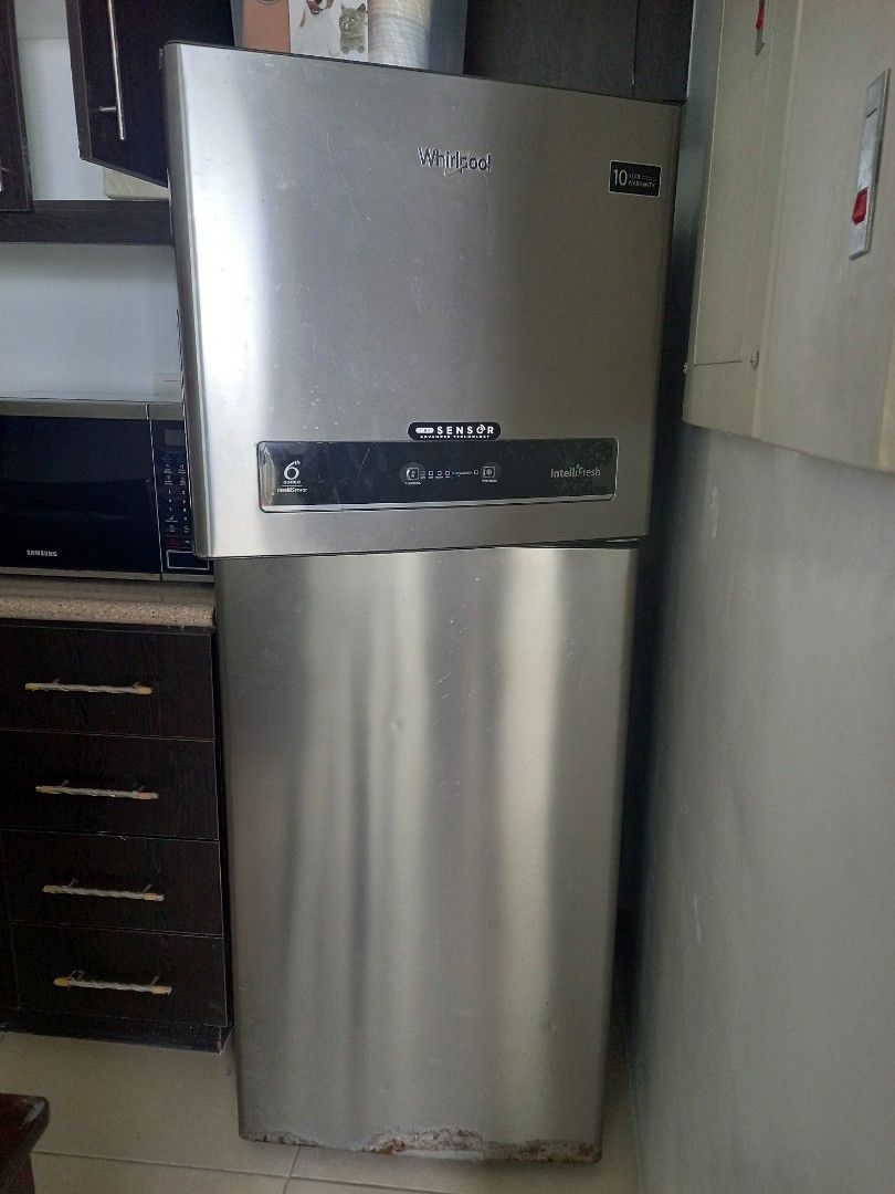 Whirlpool Stainless Steel Refrigerator (Category: Refrigerators and Freezers) located in Paranaque City. Submitted by janmar02 (Listing ID 1444942859, Image 3). Description: - Whirlpool Top Freezer Refrigerator - Sleek Stainless Steel Finish - Ample Storage Space for Groceries - Fully Functional and Works Well - Minor Scuffs from Normal Use - Ready for a New Home.